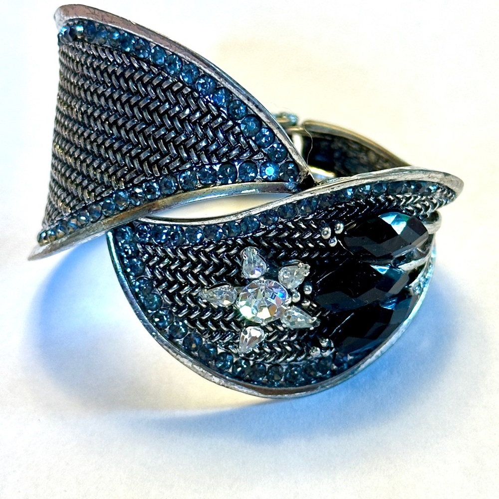Sophisticated Silver and Black Bracelet with Intricate Detailing